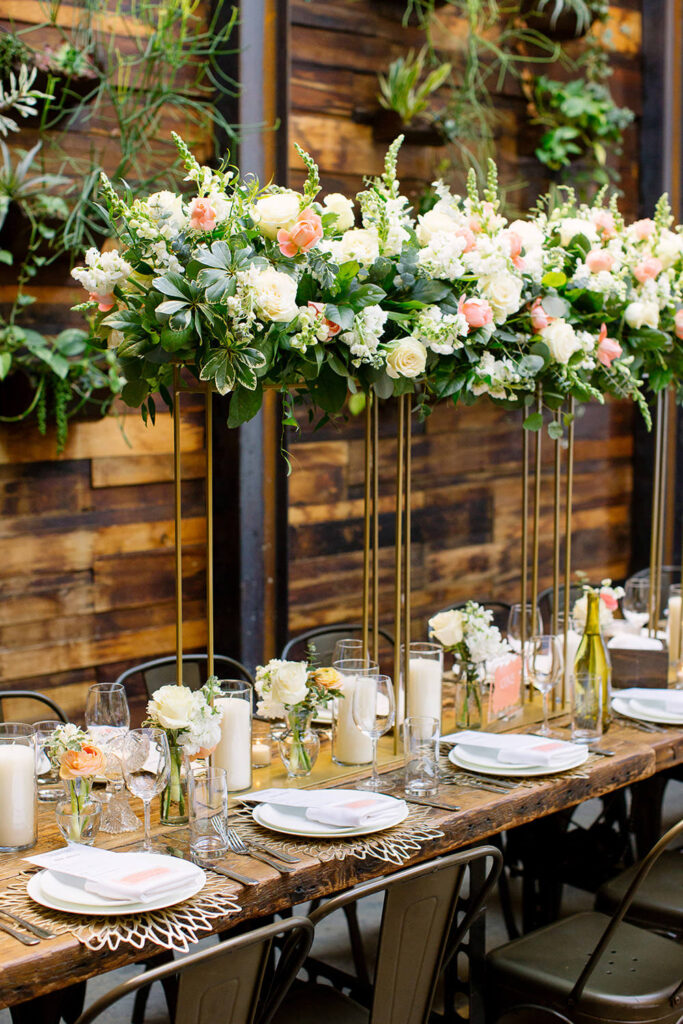 Wedding reception tables at the Brooklyn Winery in New York, with flowers by Bedford Village Flower Shoppe
